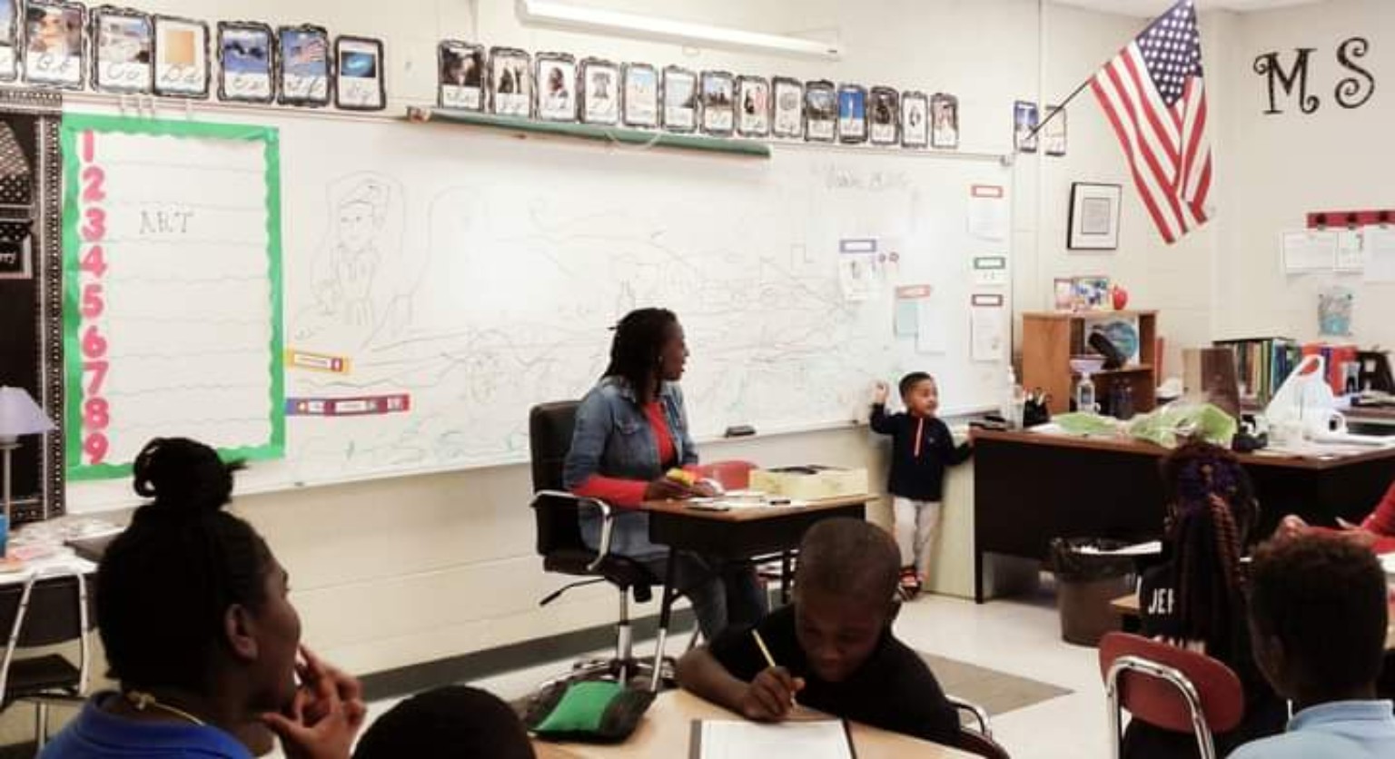 Tiffany teaching and engaging with children in a classroom